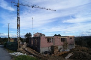 House building along the road.